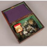 An inlaid rosewood jewellery box with contents of jewellery oddments.