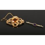 Two brooches, comprising of a 9ct gold bar brooch with a central Amethyst stone (4.5cm), together