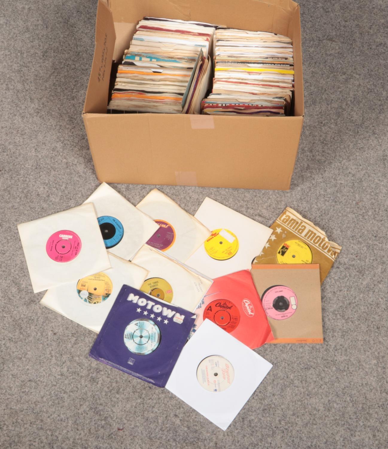 A box of single records. Mainly 1970s examples.