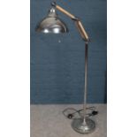 A large chrome angle poise standard lamp. Snap to metal on shade attachment.