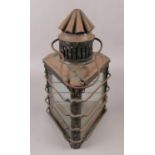 A 19th century oil lantern of triangular form, by John Evitt London. Chip to bottom edge of one