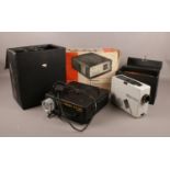Three projectors. Includes Kodak Carousel S-AV 1030, Kodak Retinamat 210 and a boxed Dixons