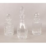 Three cut crystal decanters.