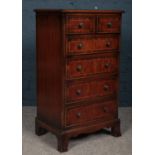 A Mahogany chest of drawers - two short over four long drawers with metal handles. H-84.5cm, W-47cm,