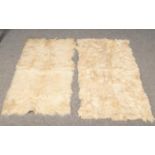 Two Goat hides - L: 128cm, W:66cm Please note that one of the hides there is a material backing, but