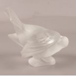 A Lalique glass figure of a bird, 10cm height Chip and crack to one wing.