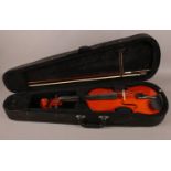 A Violin (un-named) with bow and padded carry case. Total length: 60cm, W: 20cm. Condition