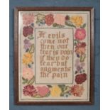 A framed embroidery. Bearing Benjamin Franklin quote "If evils come not then our fear is vain if