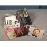 A collection of vinyl LP records. ABBA, Frank Sinatra, Jim Reeves examples etc