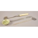 A collection of white metal items. Includes novelty WMF meat skewer, ivory handled stilton scoop,