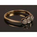 A vintage 18ct gold and 3 stone diamond ring. Size N. Weight 1.92g.