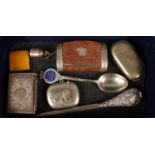 A group lot of collectables. Including silverplate vesta cases, letter opener, collectors spoon,