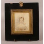 A 19th century portrait miniature in ebonised frame. Sketch of a girl on paper (9.5cm x 7.5cm).