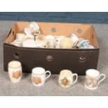 A collection of commemorative mugs. Aynsley, Ringtons, Adams examples etc.