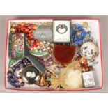 A tray of costume jewellery. Including beads, purse, rings, necklaces, etc.
