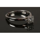 A 9ct white gold and diamond cluster ring. Size L, 1.98g.