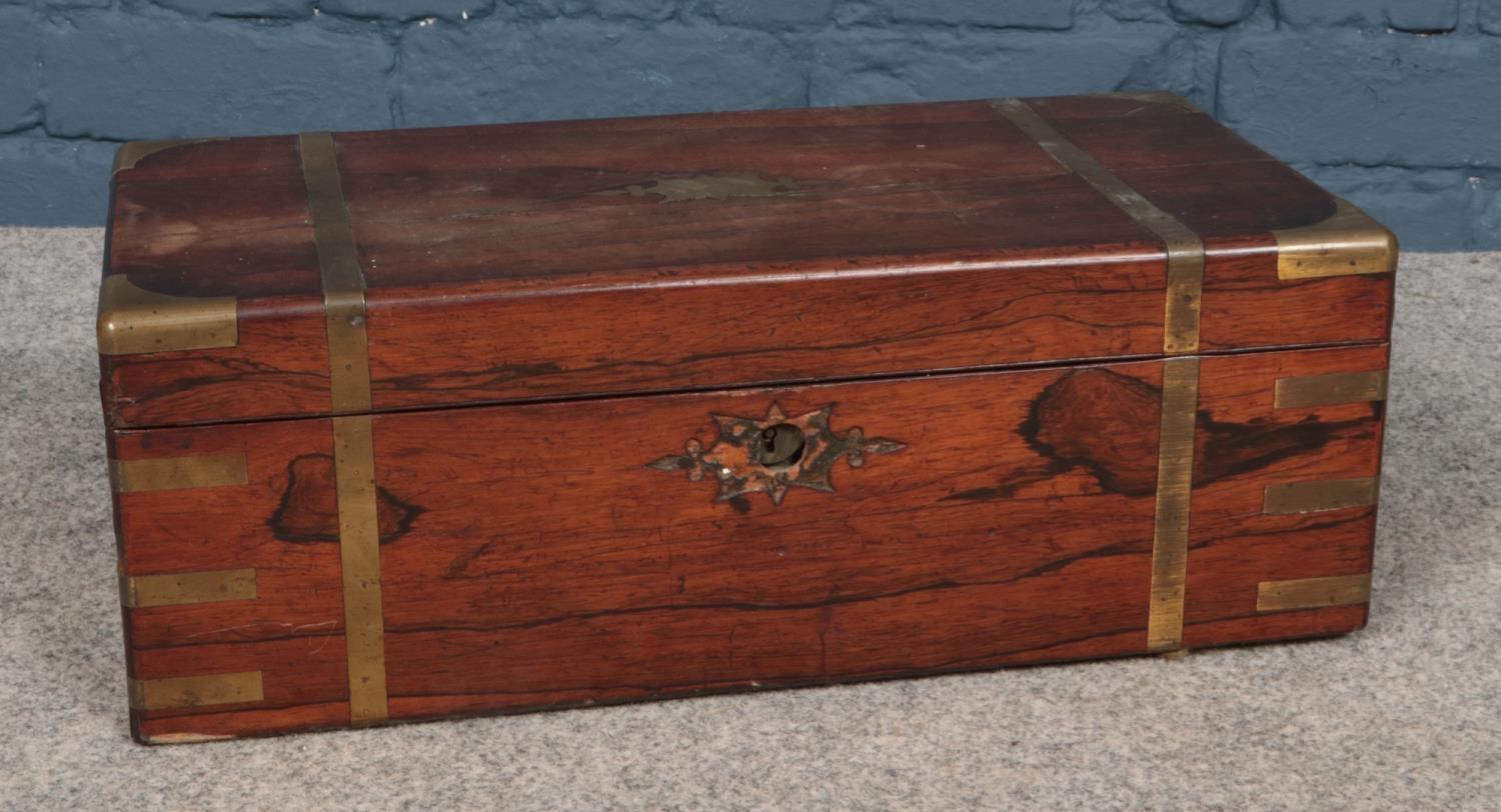 A Victorian rosewood writing slope. (50cm width 25cm length)