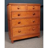 A Victorian Pine Chest of drawers, with original key. H:119cm, W:106cm ,D:43cm. Later split, some