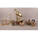 A collection of metalwares, to include two brass candle sticks, a EPNS three piece tea service and a