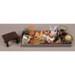 A tray of doll's house miniatures. Including globe, bears, table, etc.