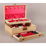 A collection of costume jewellery in a jewellery box. Comprising of mostly necklaces etc. Box: H: