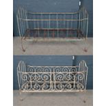 Two French wrought iron folding day beds.
