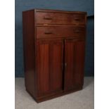 A gentleman's Mahogany dressing Chest H:126cm, W: 83.5cm, D: 44.5cm. Condition fair.