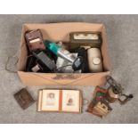 A box of miscellaneous. Includes Victorian photograph album, Sievert blow lamp, Roberts radio etc.