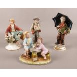 A group of Capodimonte figures.