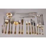 A large collection of cutlery - comprising of 143 piece gold plated set by 'Royal Solingen' together