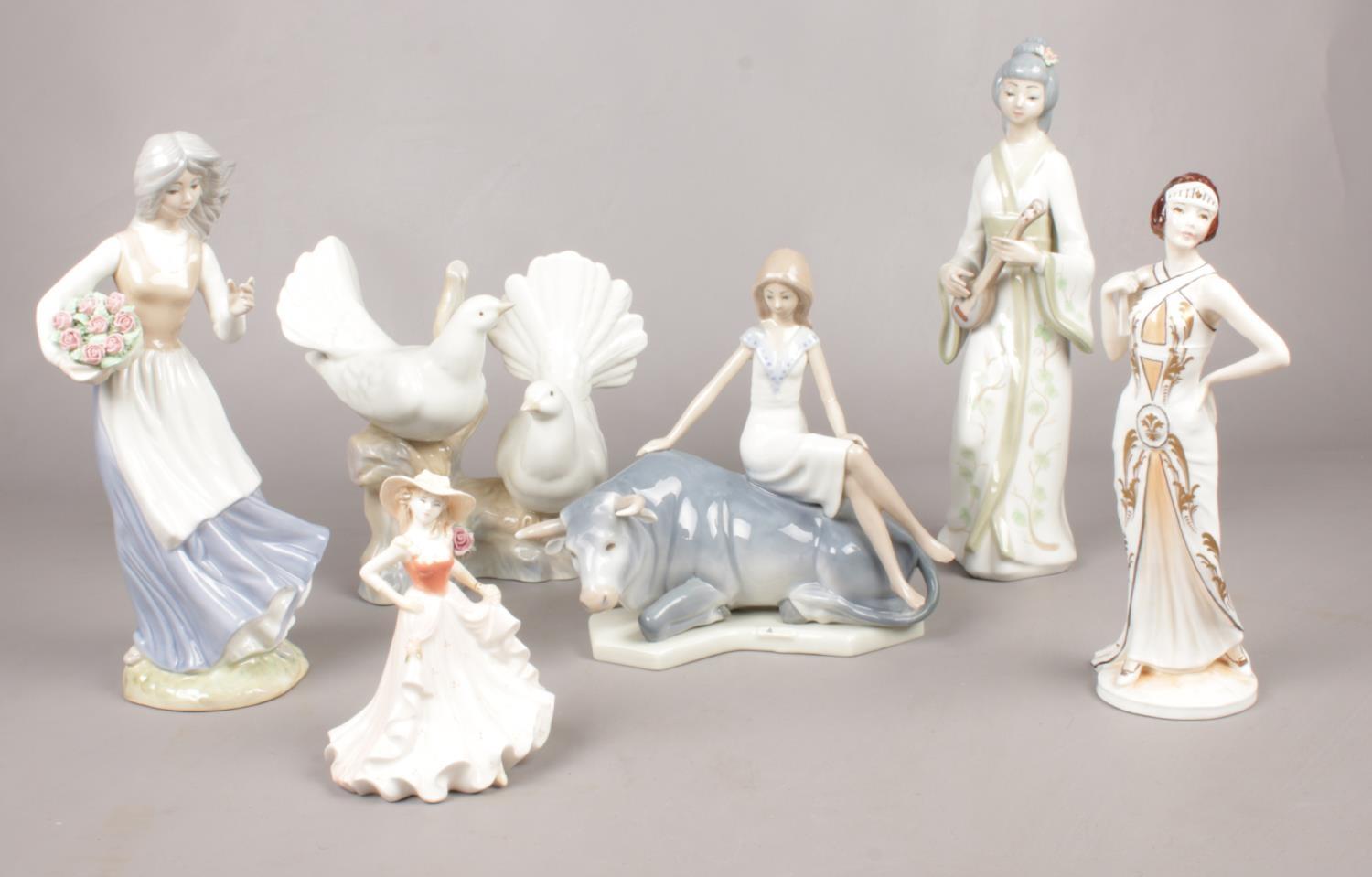 A collection of figurines. Coalport 'Birthday Wishes', Porceval Villamarchante White Doves, Norcroft