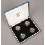 A Royal Mint Heraldic Beasts silver coin proof set, 2004.