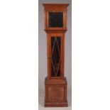 A carved oak longcase clock case.