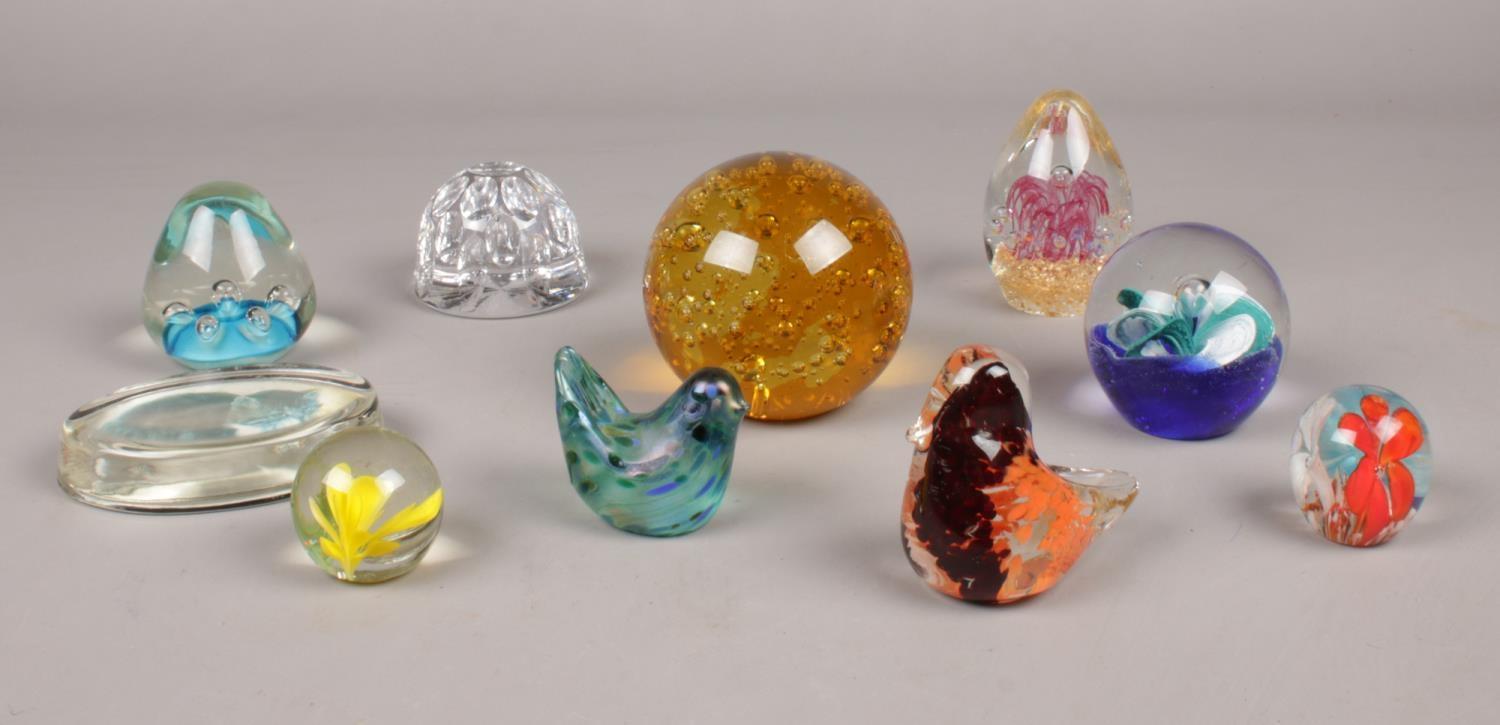 A group of glass paperweights. Various sizes and designs. (one boxed)