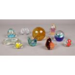 A group of glass paperweights. Various sizes and designs. (one boxed)