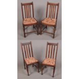 Two pairs of oak spindle back chairs.