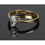 An 18ct gold and pear shaped diamond ring, stamped 41 to inside of the shank. Size K. Weight is 2.