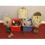 Two boxes of clock parts - comprising of clock faces, pendulums and internal parts etc. Condition