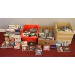 Three boxes of CD's & one box of DVD's - comprising of various genres.