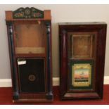 Two mahogany cased American style wall clock cases. With coloured glass panels.