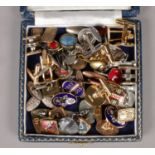 A box of mid 20th century cuff links to include enameled examples etc.