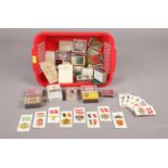 A selection of vintage match boxes (31), together with (approx. 64) player's cigarette cards of