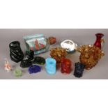 A quantity of art coloured glass. Including animals, candle holders, etc.