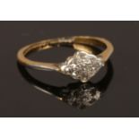 An 18ct gold & platinum diamond ring. Size M, weight 1.71g. (size of head 10mm x 7mm). Stones appear