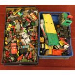 Two boxes of playworn model vehicles. Includes Corgi, Matchbox, Burago, Tonka etc.