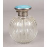 A George V globular glass scent bottle with silver and blue guilloche enamel hinged top. Assayed