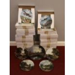 A selection of twenty seven Royal Doulton plates - comprising of 22 boxed plates mostly of