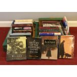 Two boxes of assorted genre books. Caleb Carr The Alienist, John Maynard Keynes The General Theory