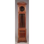 A carved oak longcase clock case.