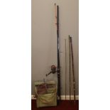 A collection of fishing equipment. Includes SurfSeeker fishing rod, reel, net, bag and three volumes